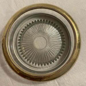 Vintage wine/champagne bottle coaster. Brass and cut glass starburst pattern.